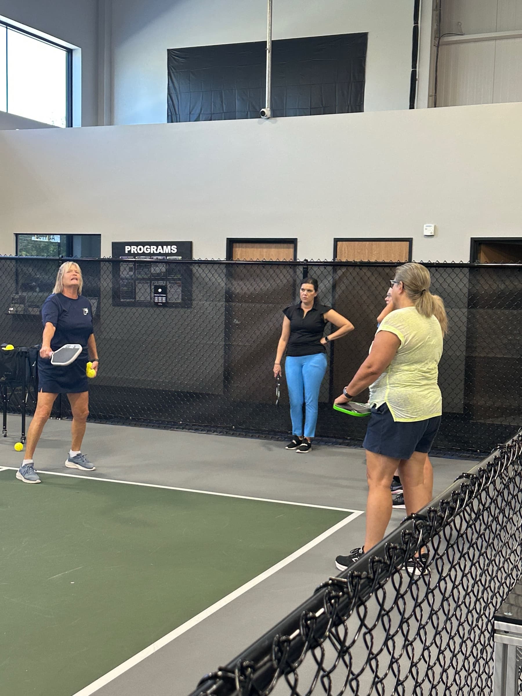 Coach demonstrating technique at Pickleball 365 Fair Haven
