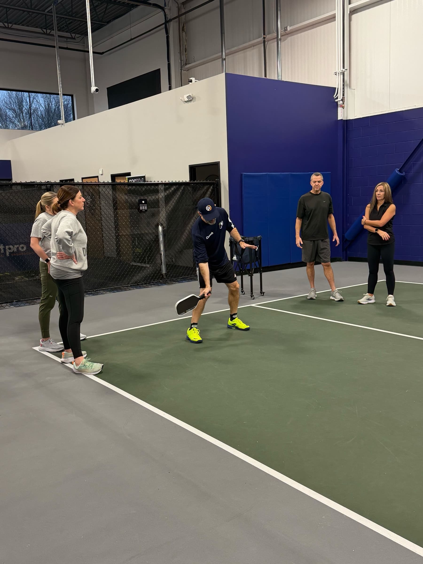 Coach engaging with players at Pickleball 365 Fair Haven